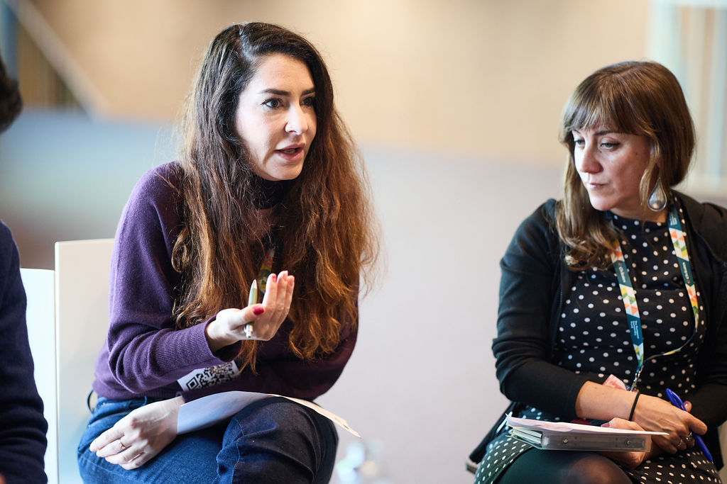 A photo of a workshop discussion at Civitates Forum