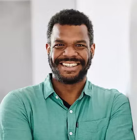 A photograph of Samuel Sigere, Programme Manager, Civitates
